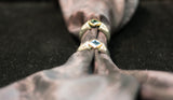 14k Gold and silver 925 ring with blue topaz \ emarald stone.