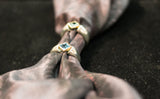 14k Gold and silver 925 ring with blue topaz \ emarald stone.